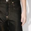Lågmidjade boyfriend-jeans i japansk lurex-denim