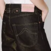Lågmidjade boyfriend-jeans i japansk lurex-denim